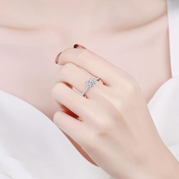 ChatGPT said: "Elegant Princess-Cut Engagement Ring with Side Accents in White Gold"